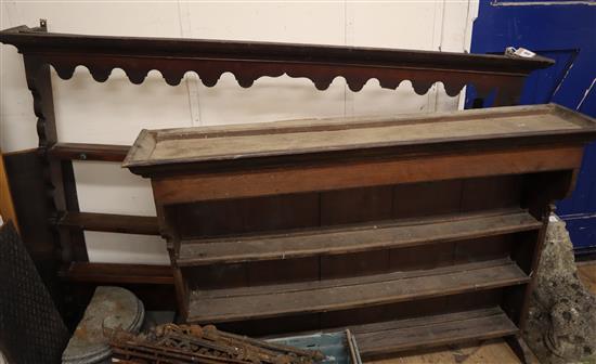 Two 18th century oak plate racks larger W.182cm
